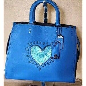 COACH X KEITH HARING BLUE PEBBLE LEATHER SEQUIN HEART ROGUE SATCHEL -nwot